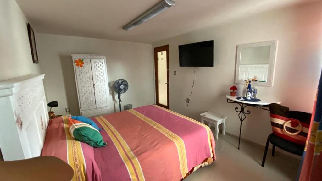 Postel nebo postele na pokoji v ubytování Casa Ana Celia