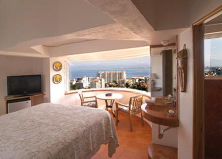 TV a/nebo společenská místnost v ubytování Casa Isabel a Boutique Hilltop Inn