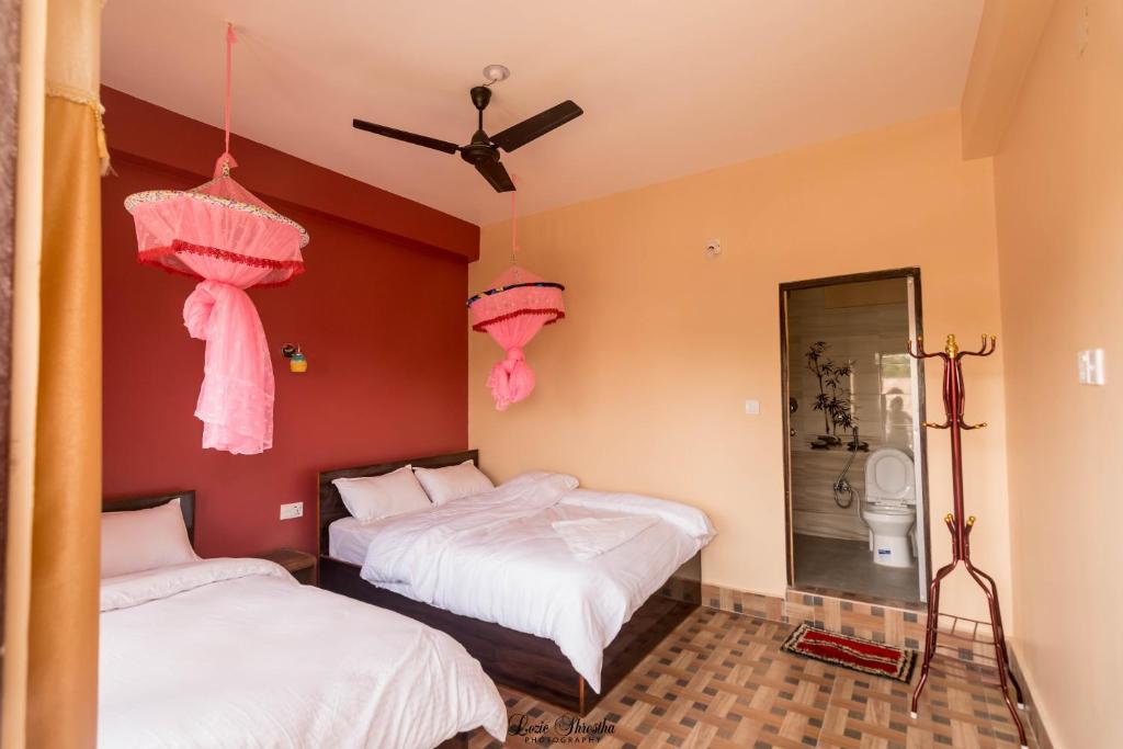 Katil atau katil-katil dalam bilik di Hotel Sweetland