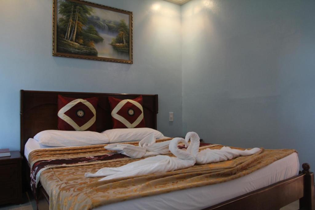 Postel nebo postele na pokoji v ubytování Bora Sky Hotel
