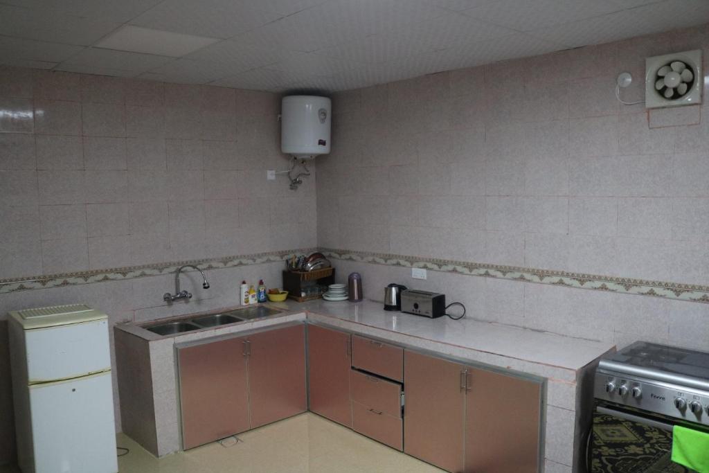 Kuchyň nebo kuchyňský kout v ubytování Jabel shams stars house