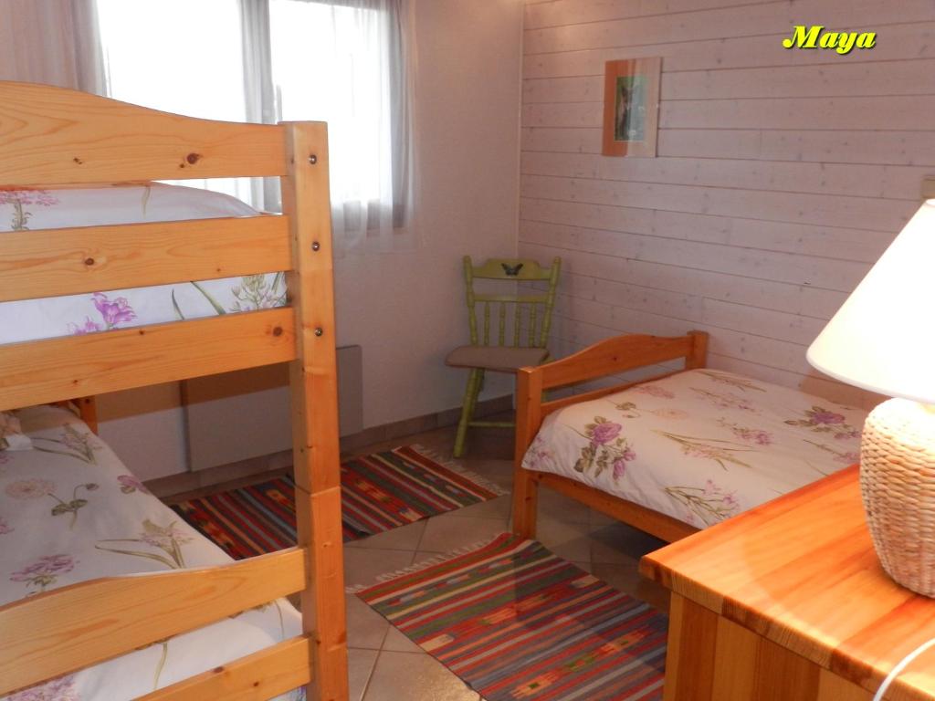 Postel nebo postele na pokoji v ubytování Appartements 5 Personnes MAYA et LOUNA