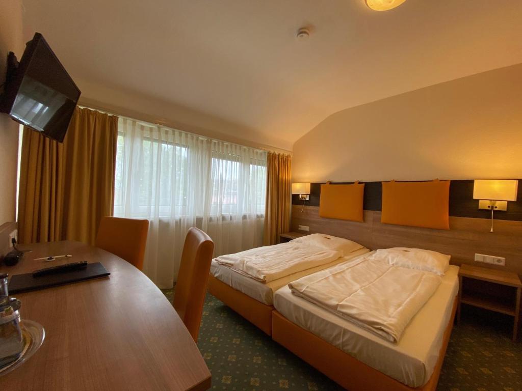 Tempat tidur dalam kamar di Römerhof