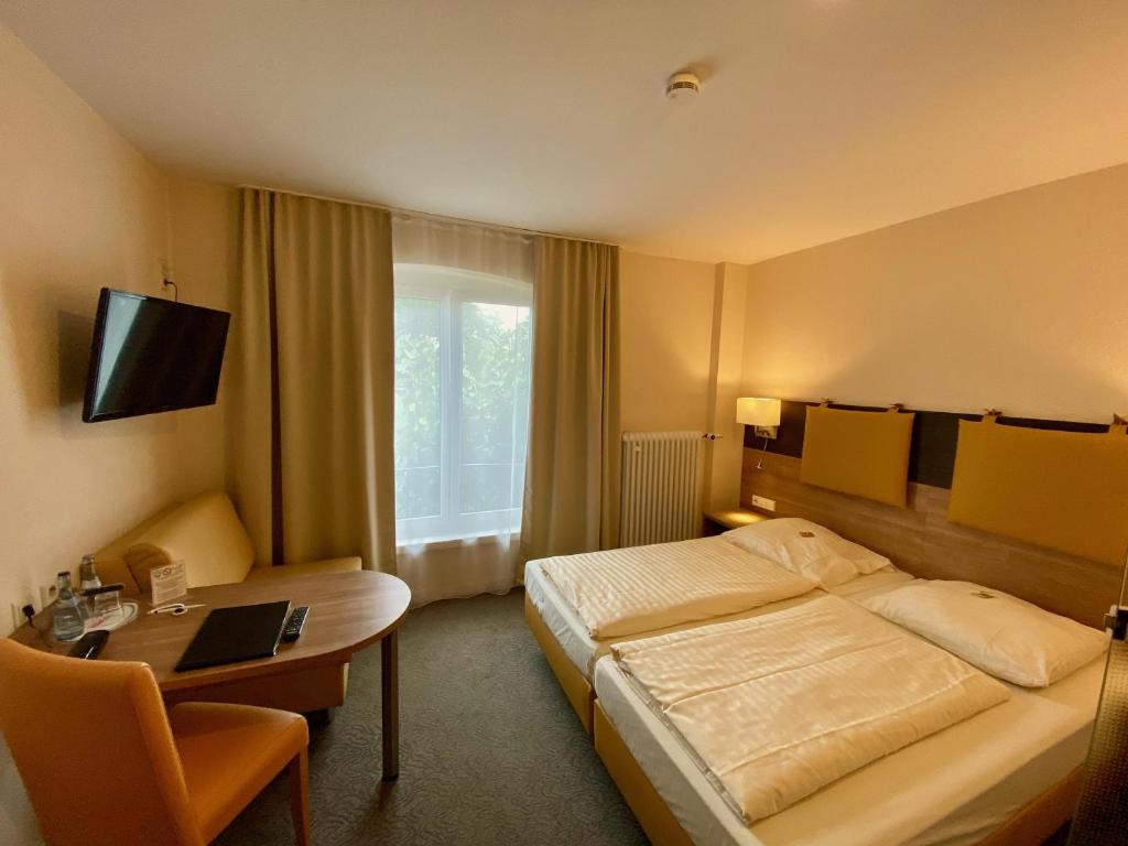Tempat tidur dalam kamar di Römerhof
