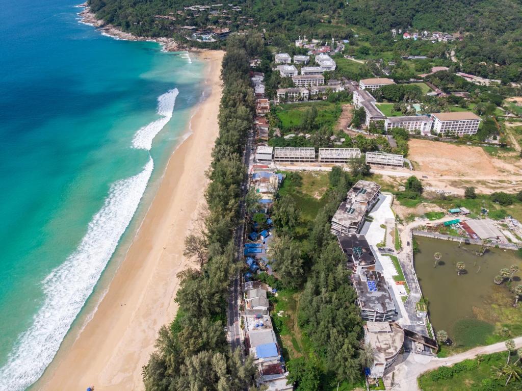 an aerial view of the shoreline of a beach at Naithon Beachfront Condotel in Nai Thon Beach