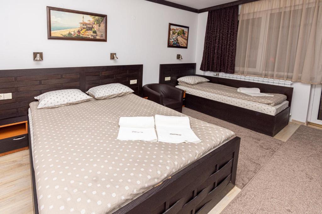 Postel nebo postele na pokoji v ubytování Sunny Paradise ll