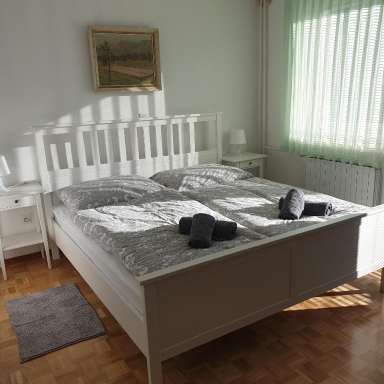 Postel nebo postele na pokoji v ubytování Apartma Vovk