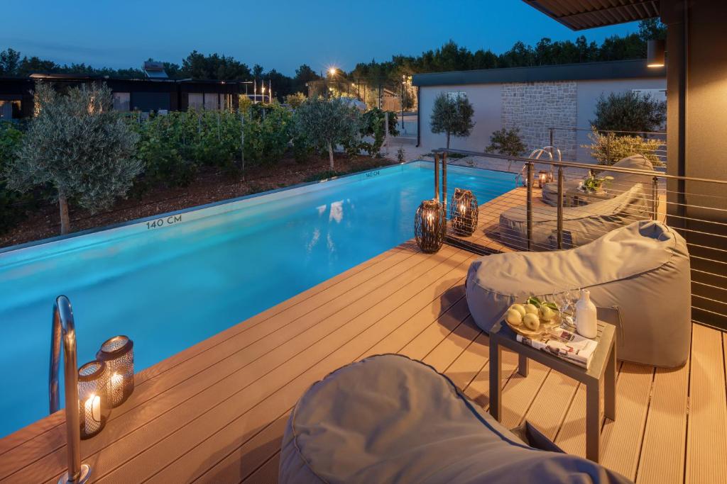 Bazén v ubytování Gava Waterman Island Cottages - All Inclusive nebo v jeho okolí