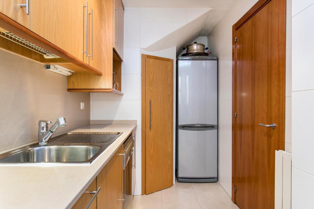 Kuchyň nebo kuchyňský kout v ubytování Stay U-nique Apartments Plaça de Tetuan