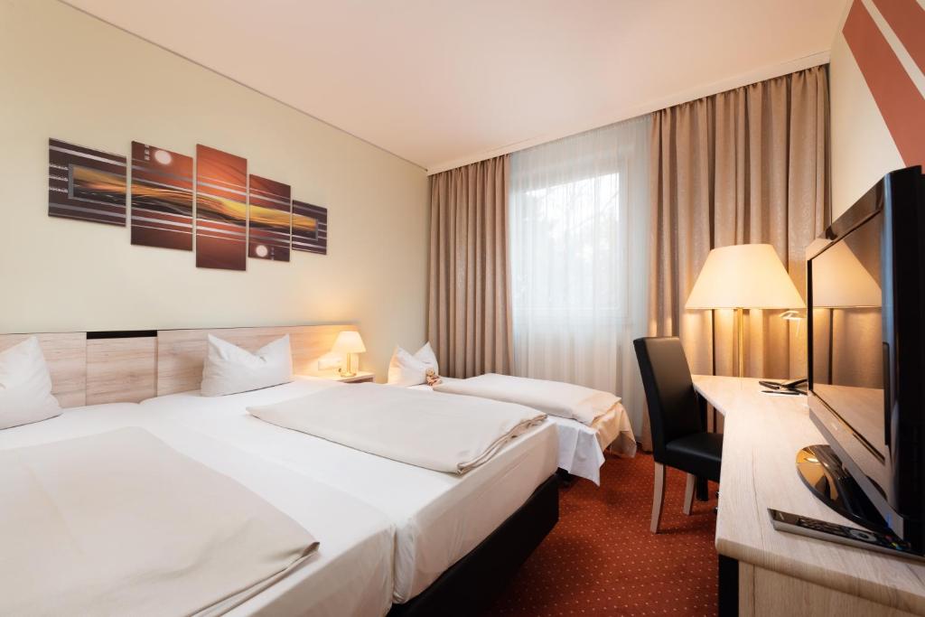 NOVINA HOTEL Südwestpark - Resim 7