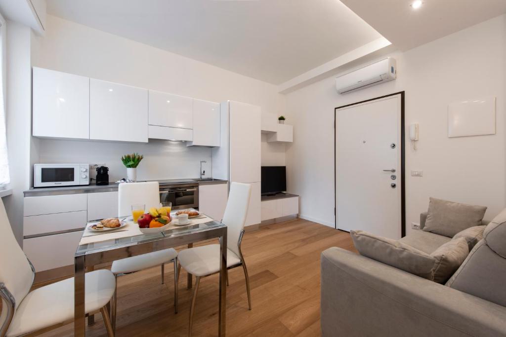 Kuchyňa alebo kuchynka v ubytovaní BnButler Friuli, 24 - Porta Romana Apartment