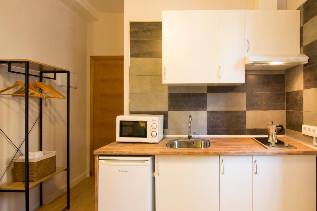 Kuchyňa alebo kuchynka v ubytovaní Apartamentos Los Lobos