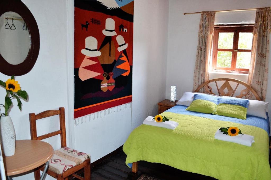 Postel nebo postele na pokoji v ubytování Colonial House Inn