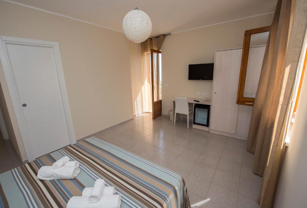 TV a/nebo společenská místnost v ubytování Donna Rosa Accommodation