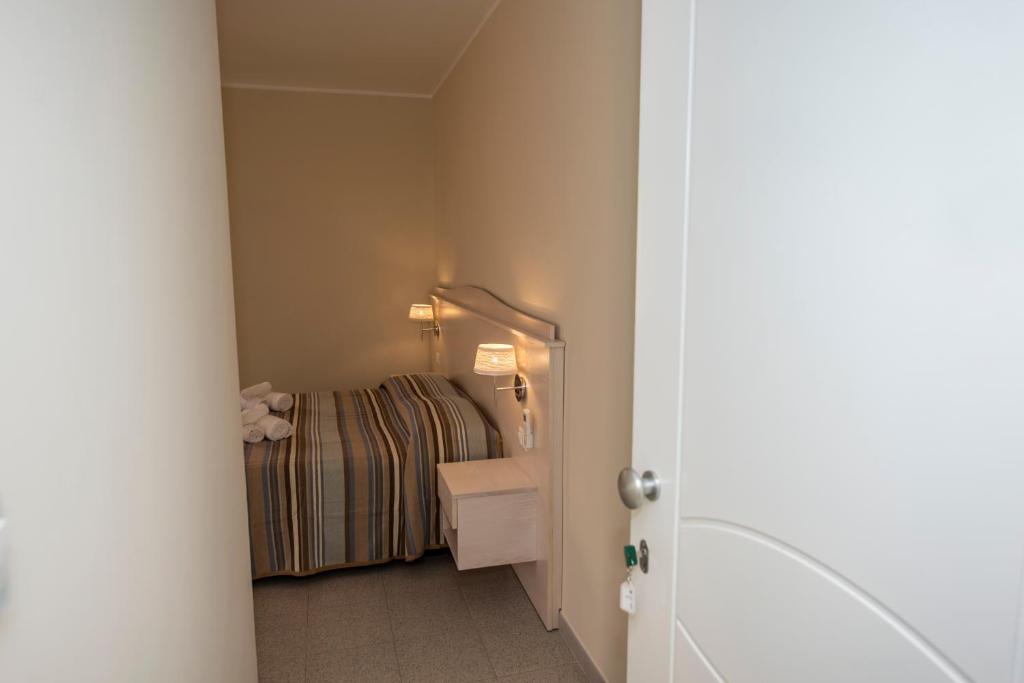 Postel nebo postele na pokoji v ubytování Donna Rosa Accommodation