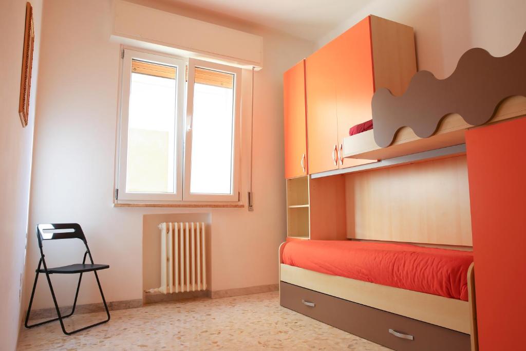Posteľ alebo postele v izbe v ubytovaní Casa Cala Portecchia