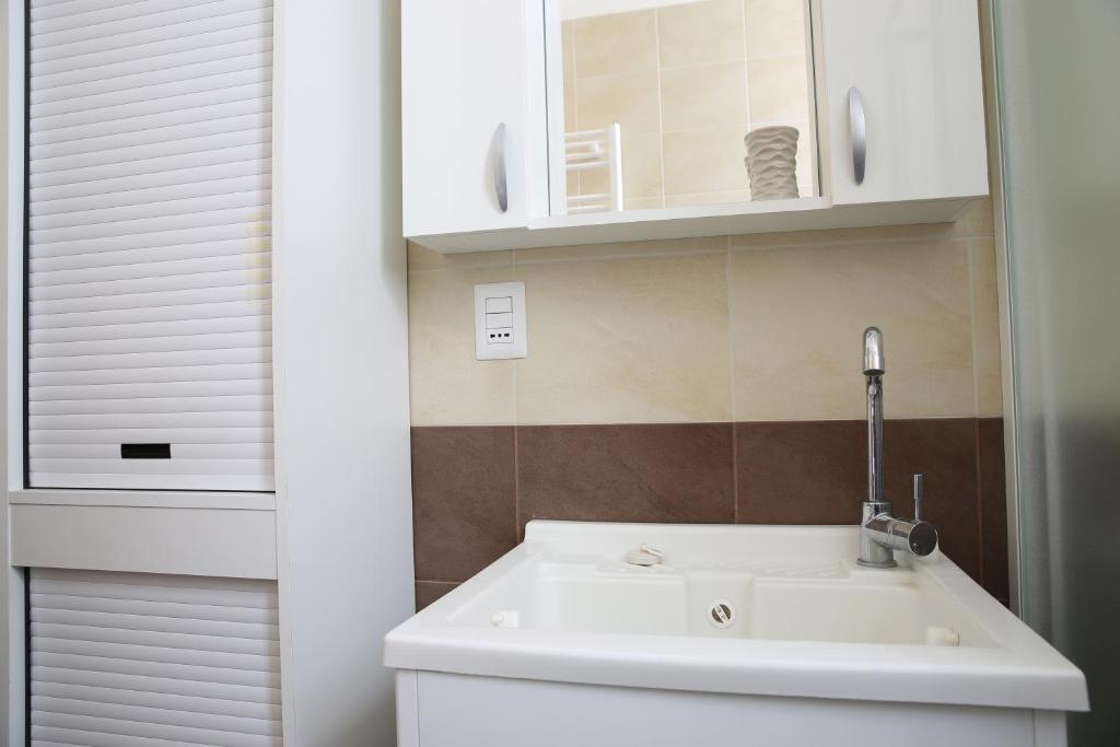 Kúpeľňa v ubytovaní Casa Cala Portecchia