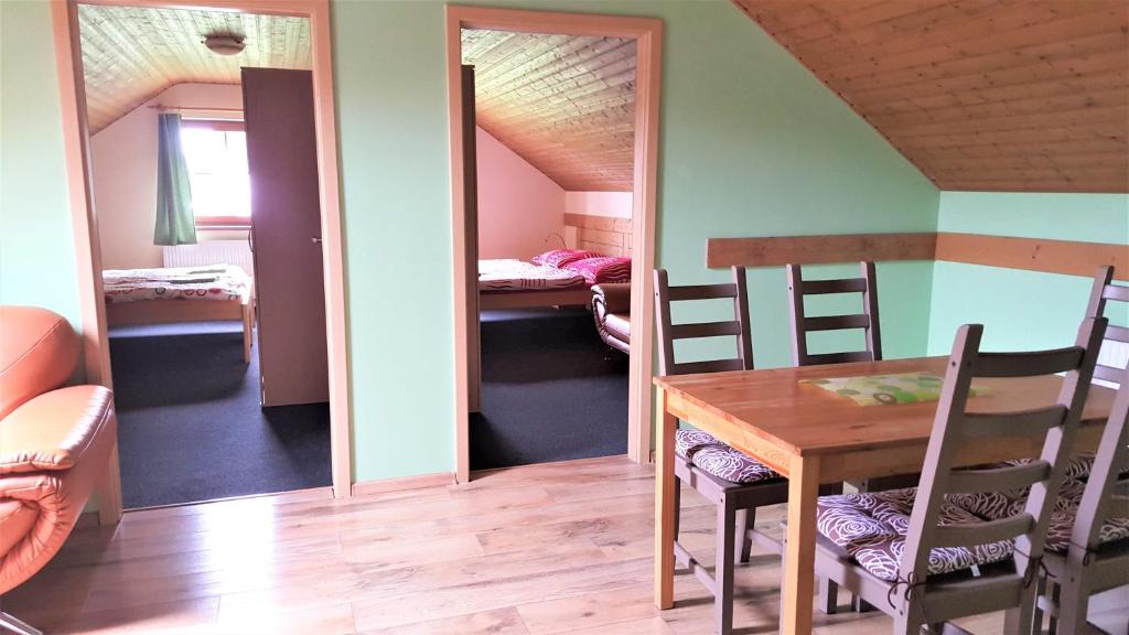 Postel nebo postele na pokoji v ubytování Apartmány Sára