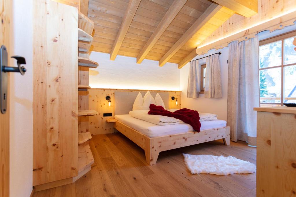 Posteľ alebo postele v izbe v ubytovaní Birnbaum Chalets Grossarl