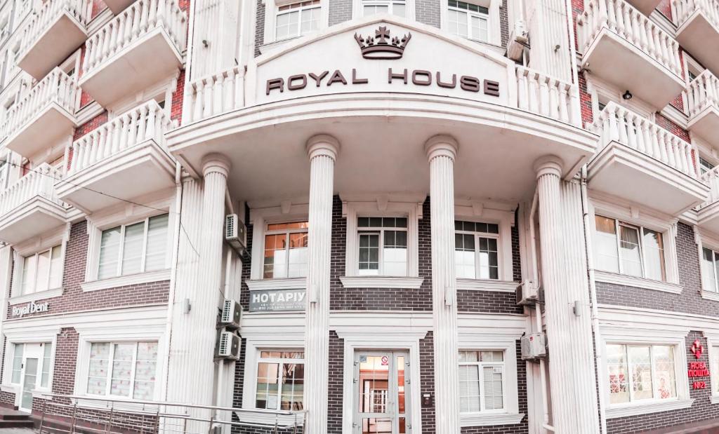 a white building with a royal house on it at Royal House Apartment in Kyiv