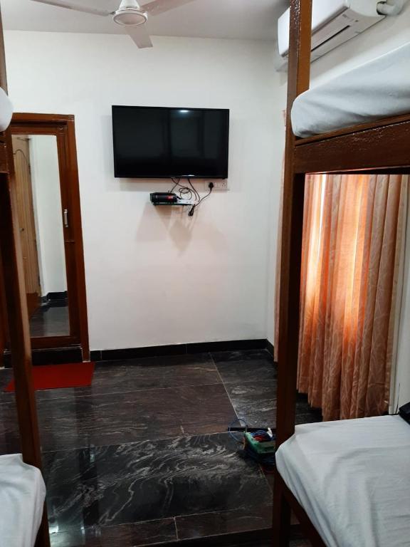 Postel nebo postele na pokoji v ubytování BAY INN