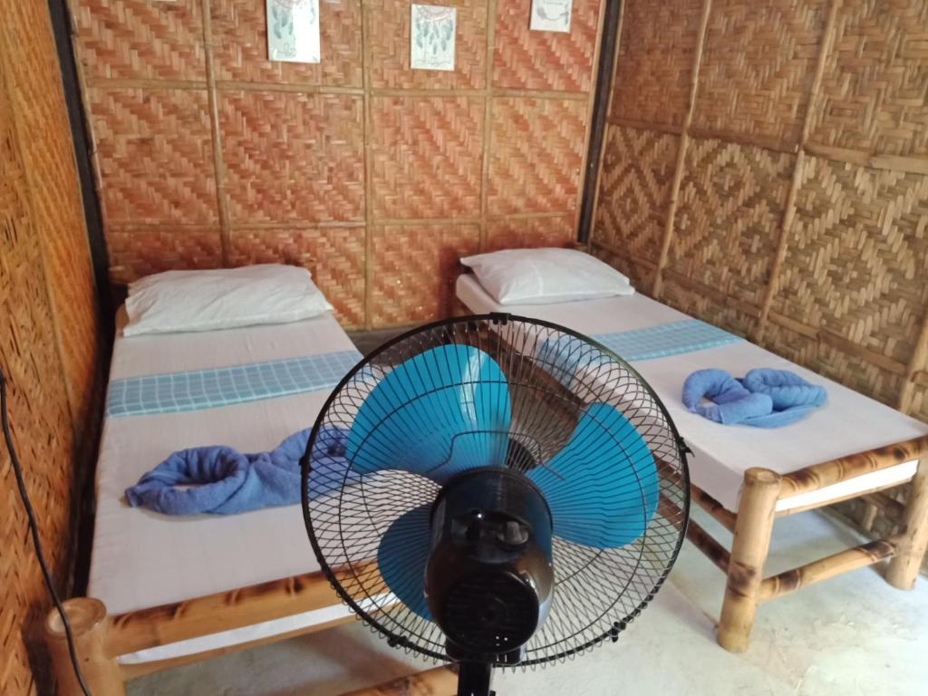 Postel nebo postele na pokoji v ubytování Walkerz Inn
