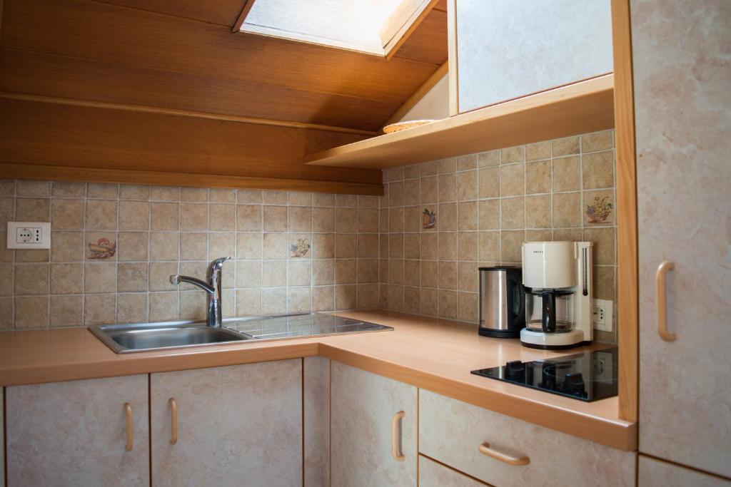 Kuchyň nebo kuchyňský kout v ubytování Pension Georgenhof