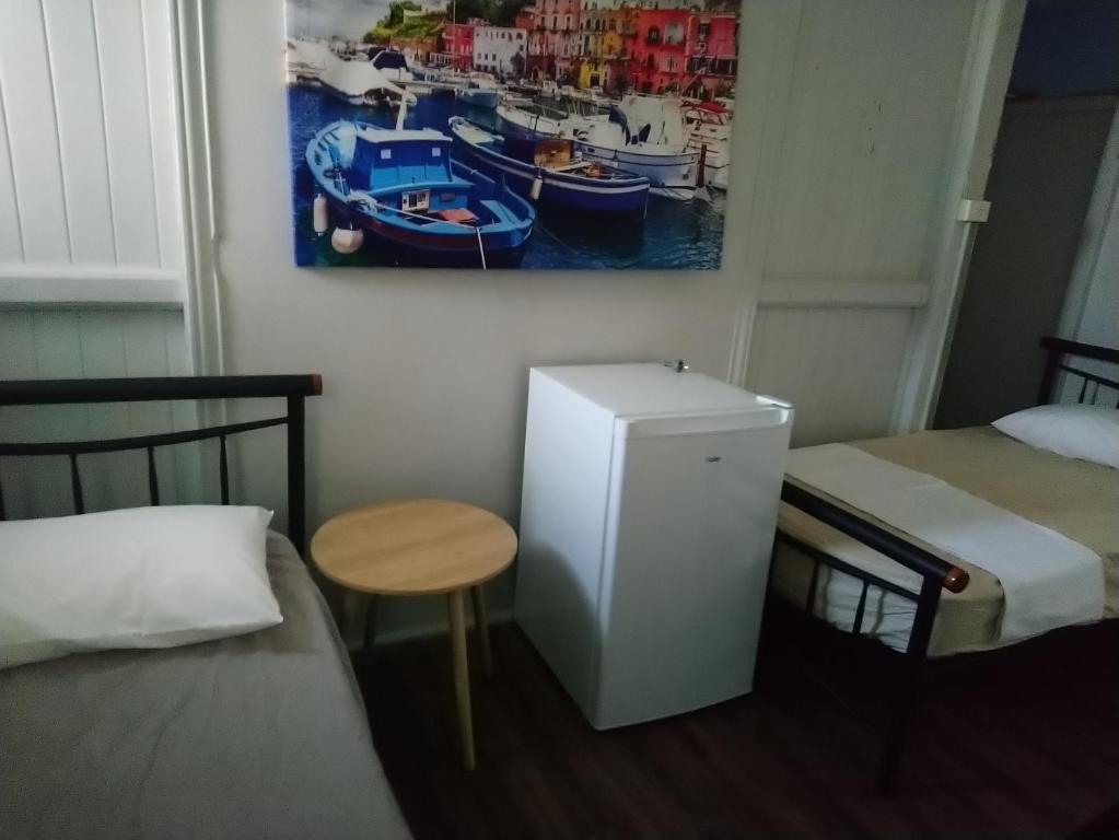 Postel nebo postele na pokoji v ubytování Mumma's Hostel Cairns