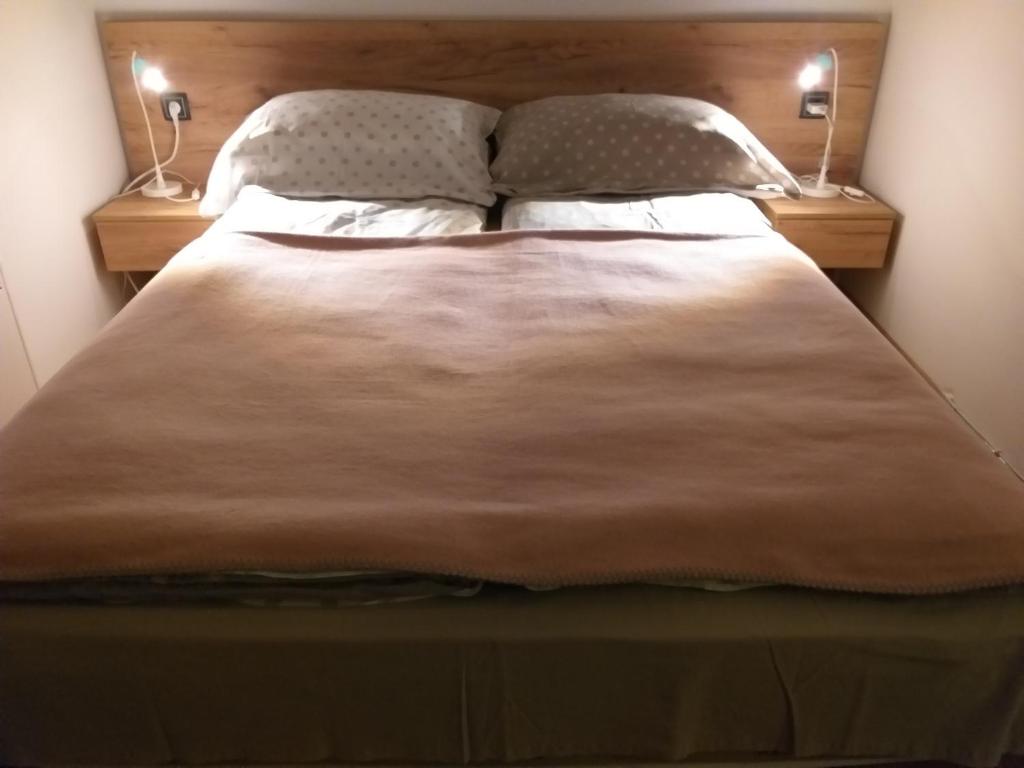 Postelja oz. postelje v sobi nastanitve apartman SUPERKLASIKO