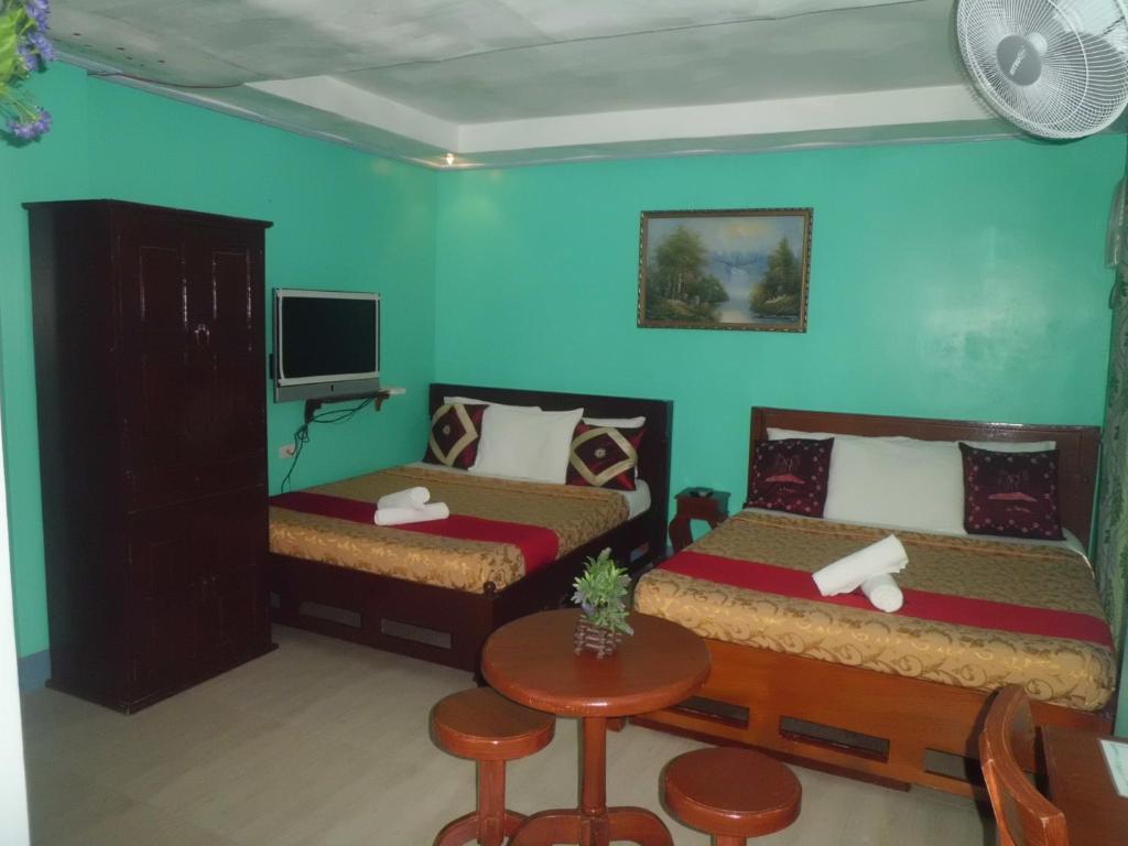 Postel nebo postele na pokoji v ubytování Bora Sky Hotel