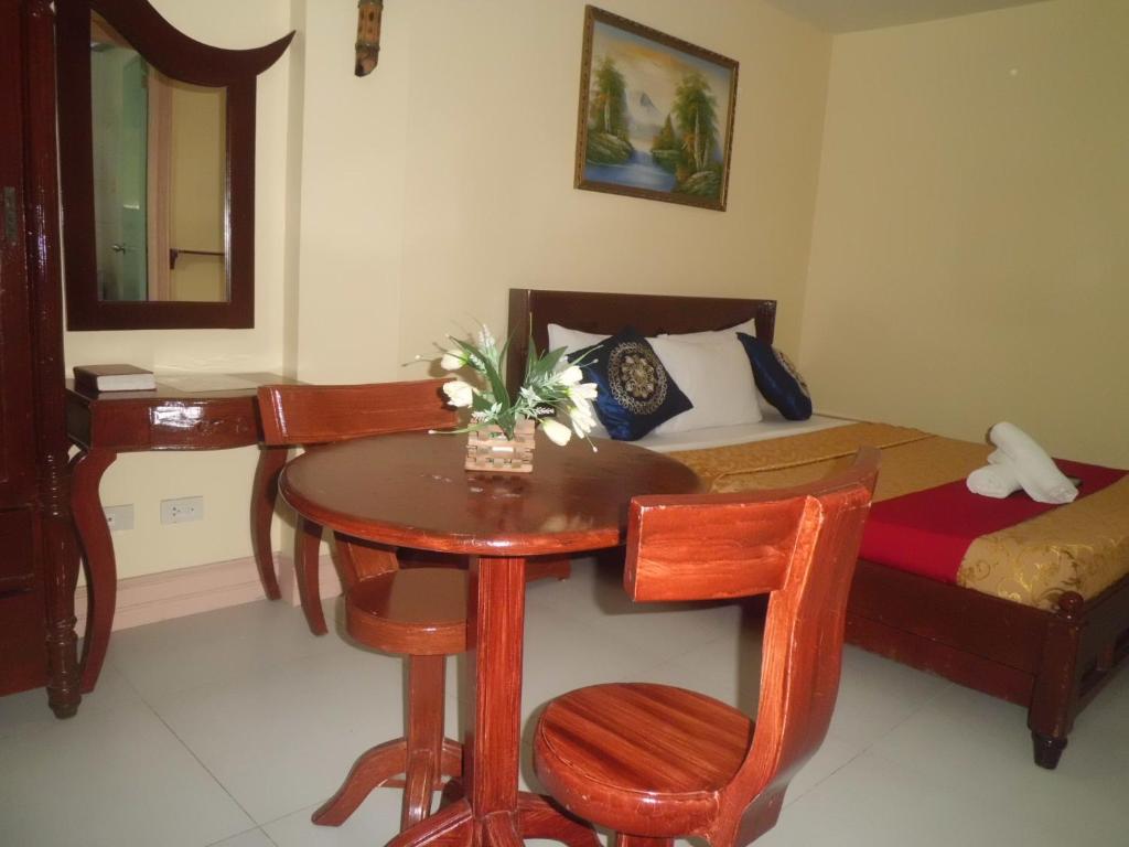 Postel nebo postele na pokoji v ubytování Bora Sky Hotel