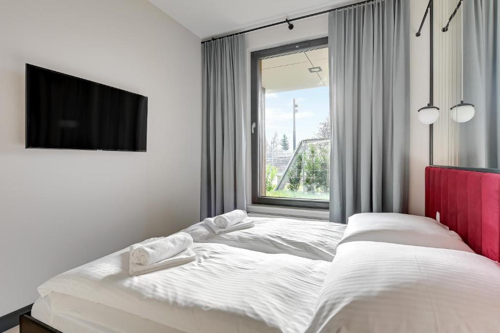 Posteľ alebo postele v izbe v ubytovaní Flamingo Beach Apartment