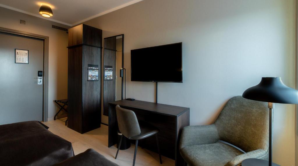 TV a/nebo společenská místnost v ubytování Quality Hotel Panorama