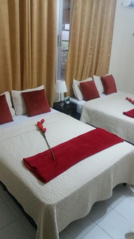 Postel nebo postele na pokoji v ubytování MH Boutique Hotel