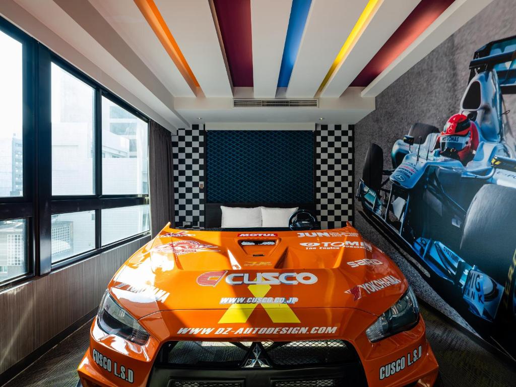 TV a/nebo společenská místnost v ubytování Kung Shang Design Hotel