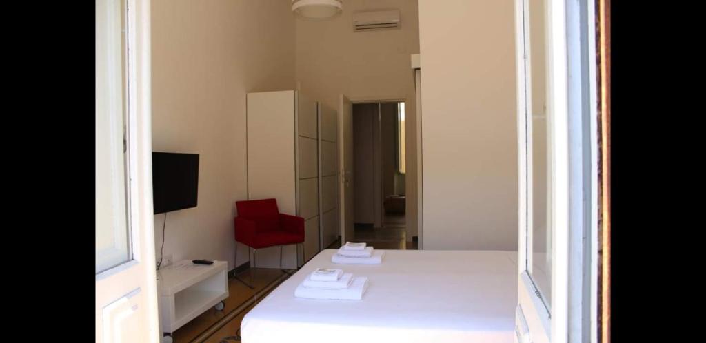 Säng eller sängar i ett rum på Cagliari d'Amare Via Roma