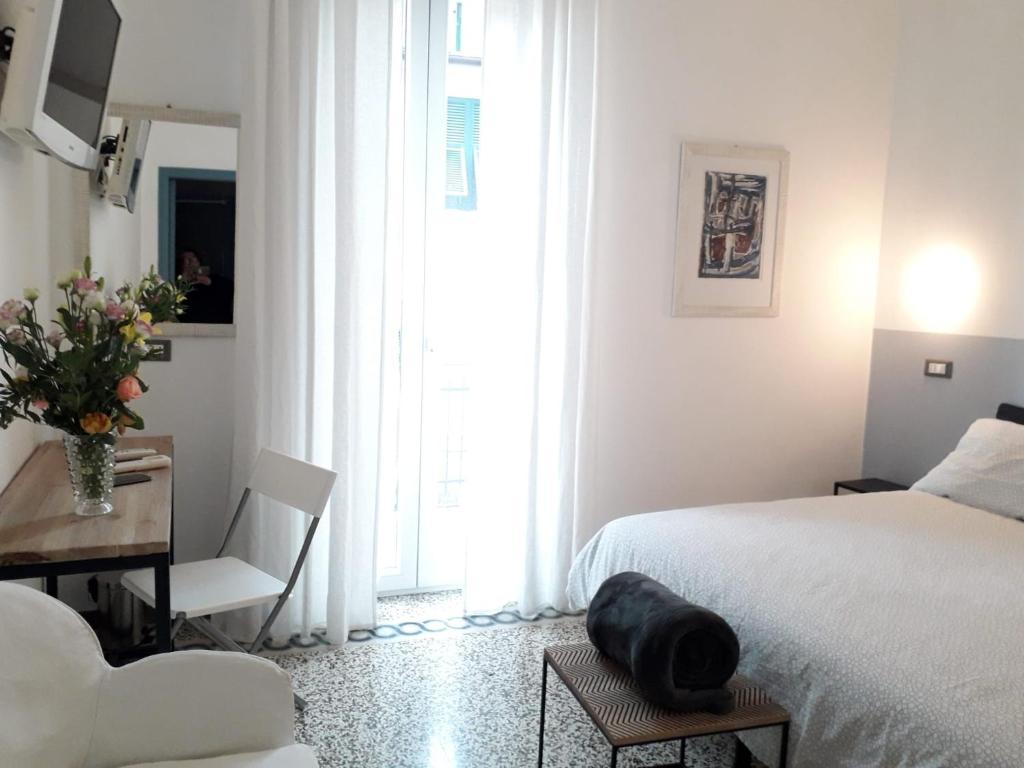Postel nebo postele na pokoji v ubytování CAMERA GIGLIA