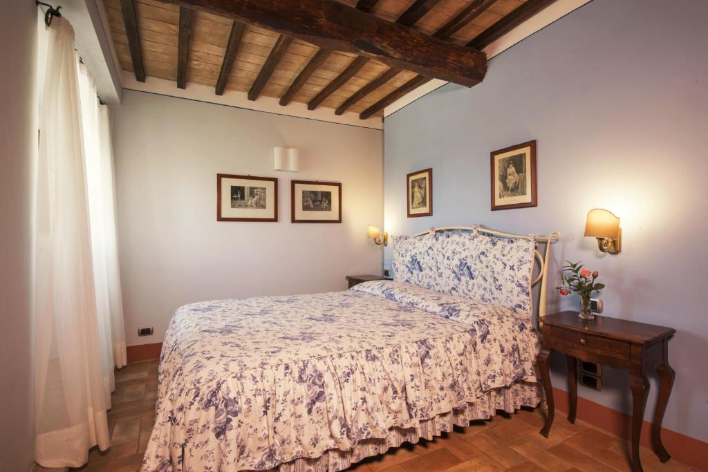 Posteľ alebo postele v izbe v ubytovaní Relais Osteria Dell'Orcia