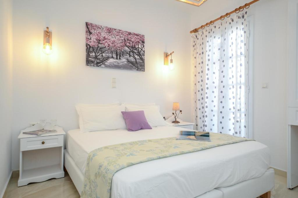 Postel nebo postele na pokoji v ubytování Hotel Anixis