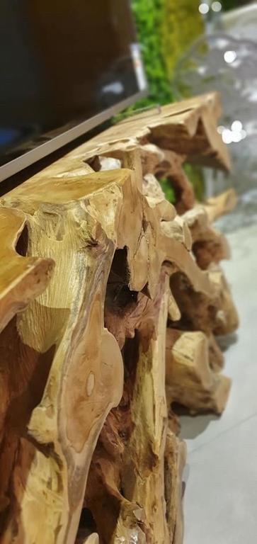 a piece of wood sitting on top of a table at Hotel Ramka & Restaurant & Wine Bar in Poznań