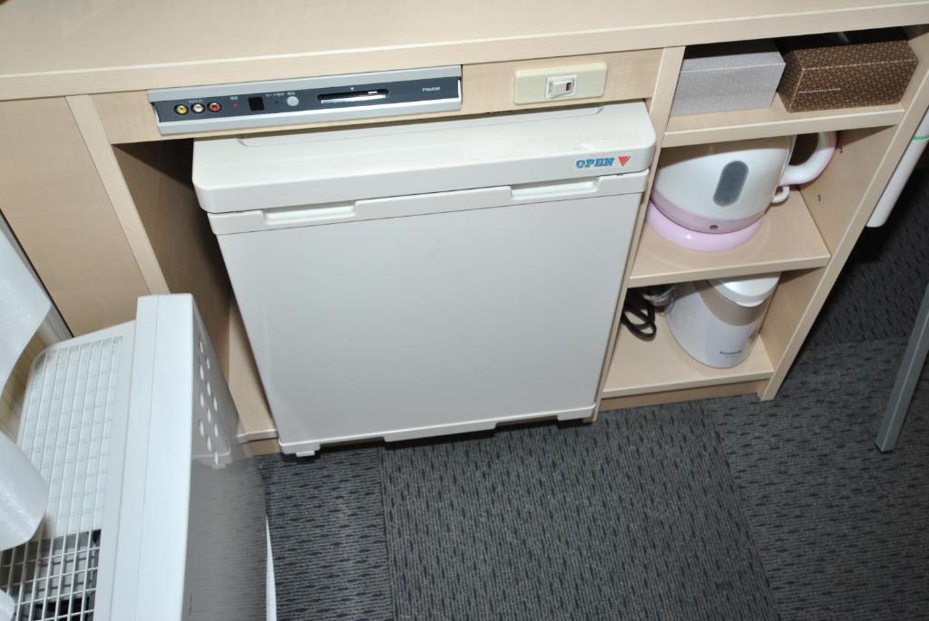 Kuchyň nebo kuchyňský kout v ubytování Hotel Mark-1 Abiko