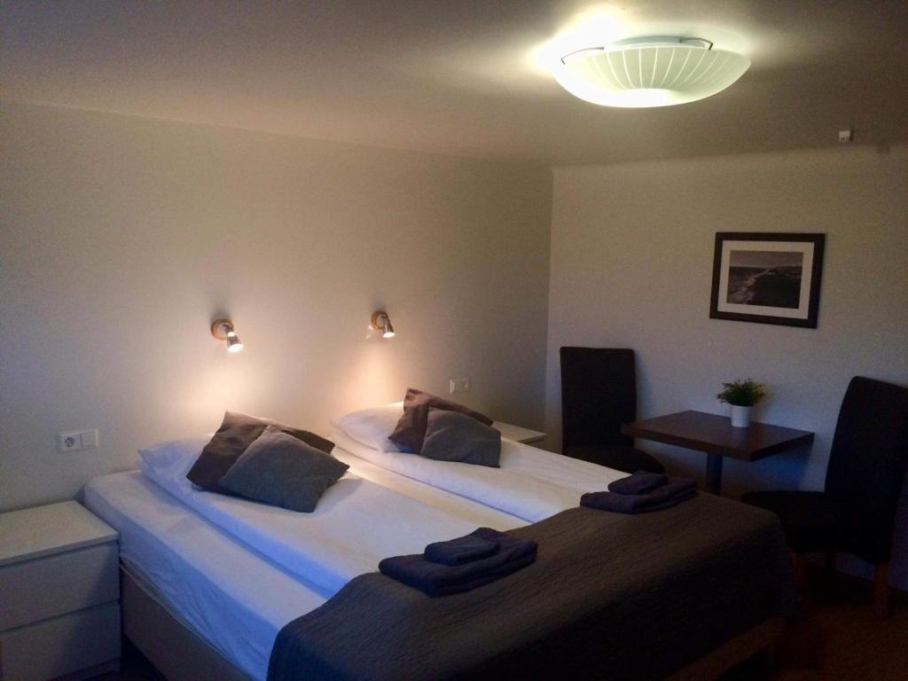 Postel nebo postele na pokoji v ubytování Guesthouse Carina