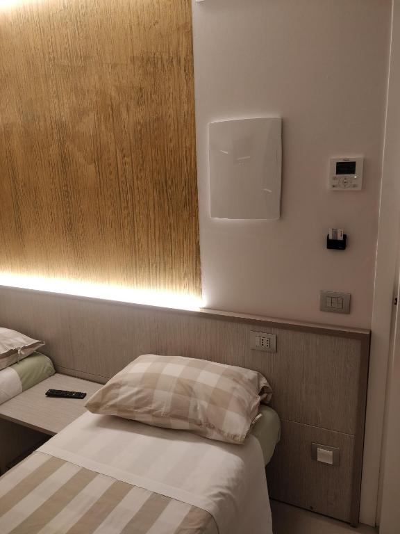 Posteľ alebo postele v izbe v ubytovaní Le 3 Botti Locanda