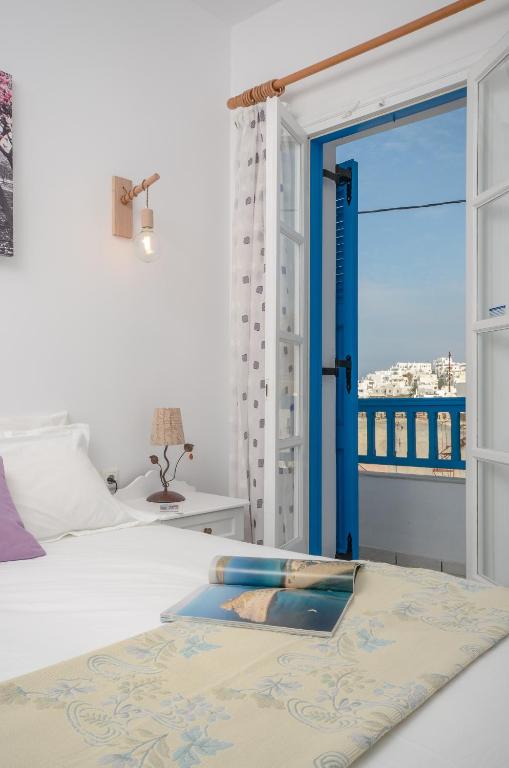Postel nebo postele na pokoji v ubytování Hotel Anixis