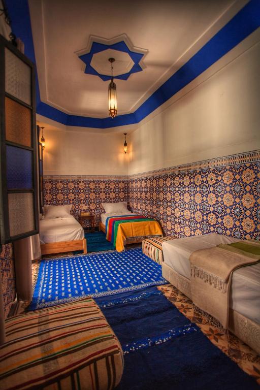 Postel nebo postele na pokoji v ubytování Riad 111 & Spa