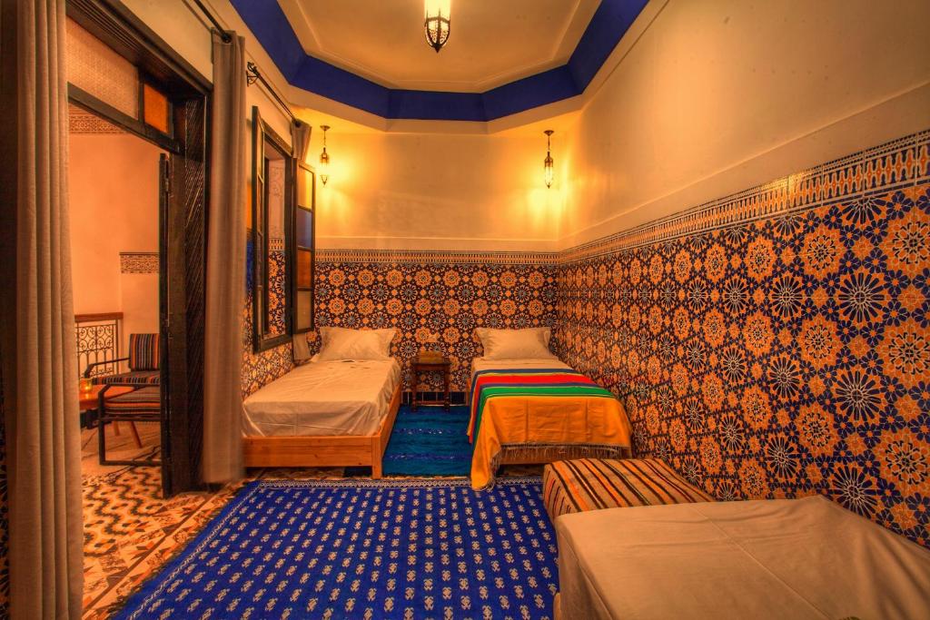 Postel nebo postele na pokoji v ubytování Riad 111 & Spa