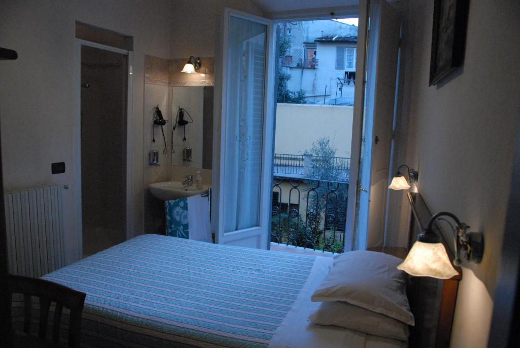 Posteľ alebo postele v izbe v ubytovaní Hotel Margaret