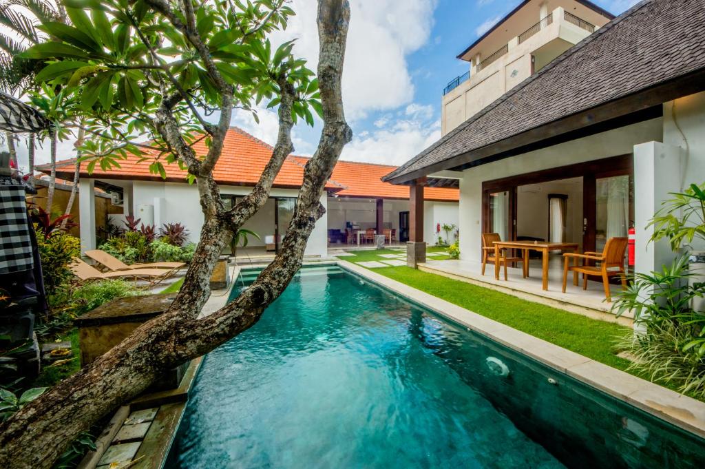 an image of a swimming pool in a villa at Nomad Hub Canggu Bali in Canggu