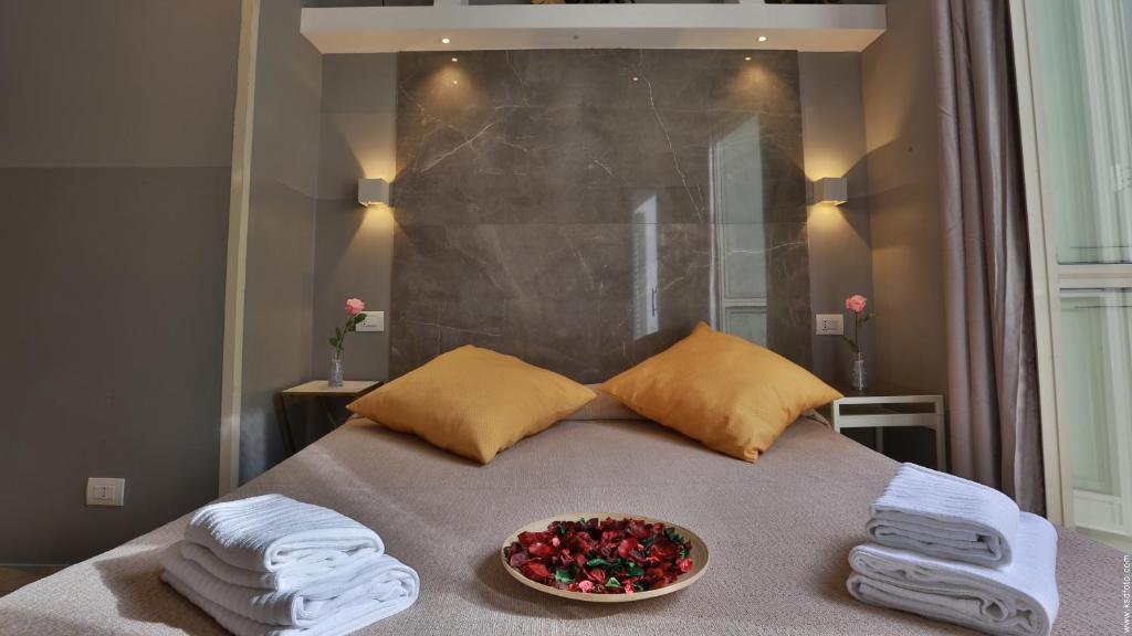 Postel nebo postele na pokoji v ubytování Hotel Giolitti Smart