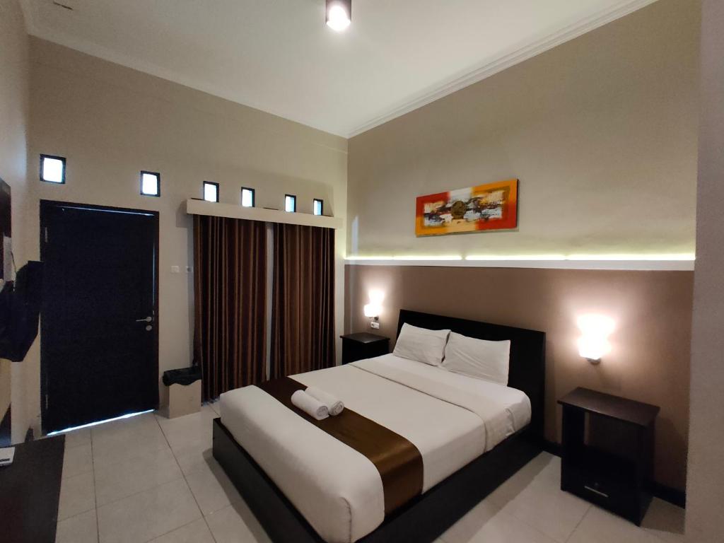 Postel nebo postele na pokoji v ubytování Hotel Orizatha